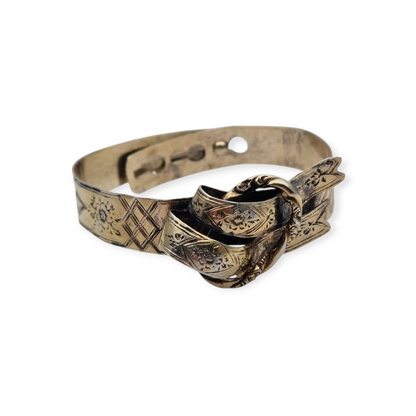 European Victorian bracelet in gilt silver with floral engraving and central bow, late 19th century