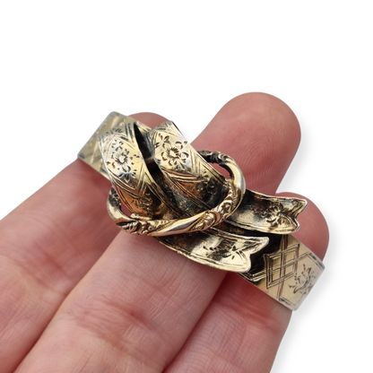 European Victorian bracelet in gilt silver with floral engraving and central bow, late 19th century