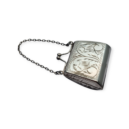 Vintage 925 silver coin purse with chain and floral engraving, 1960s.