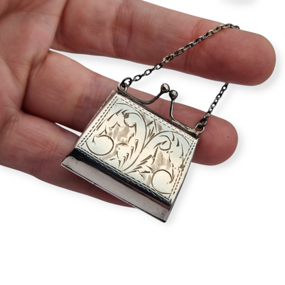 Vintage 925 silver coin purse with chain and floral engraving, 1960s.