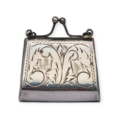 Vintage 925 silver coin purse with chain and floral engraving, 1960s.