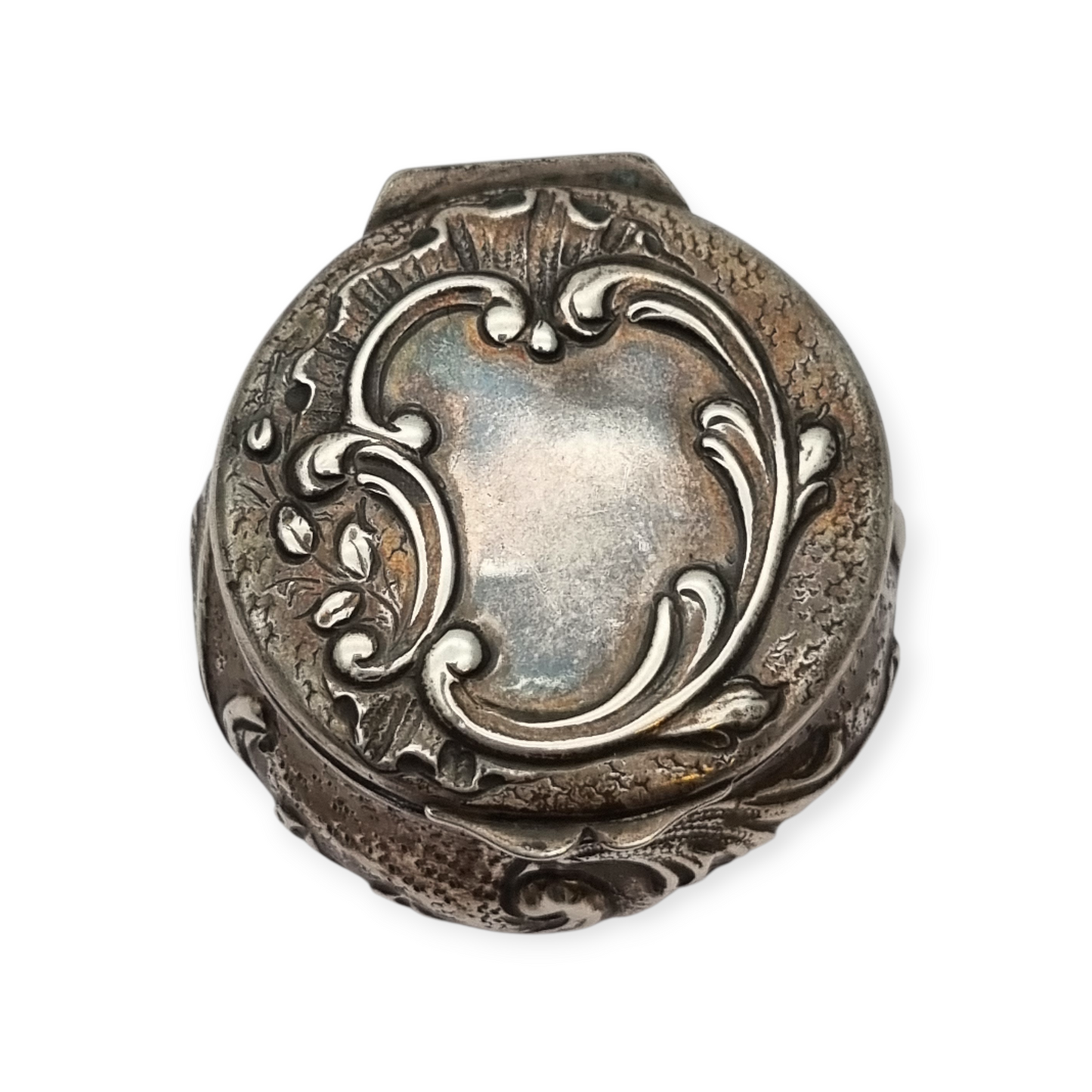 Art Nouveau silver chatelaine box with floral relief, signed JB, France, circa 1920.