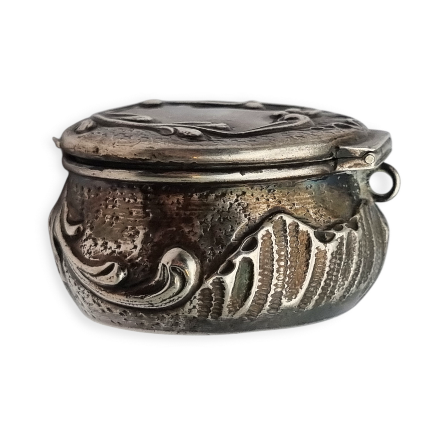 Art Nouveau silver chatelaine box with floral relief, signed JB, France, circa 1920.