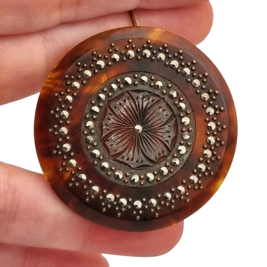 Vintage round brooch with carved celluloid and floral marcasites, 1950s-60s