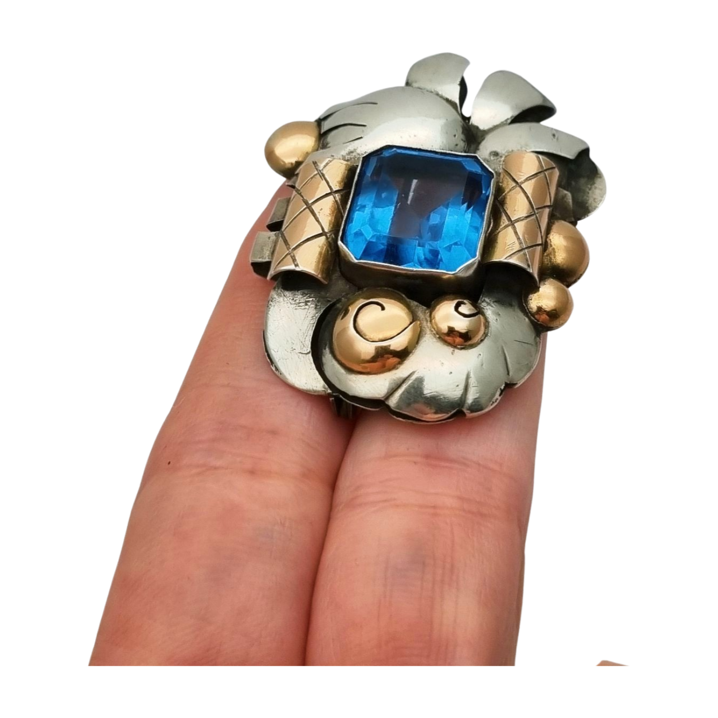 Art Deco Catalan brooch in silver with gold accents and simulated aquamarine, circa 1930-1940