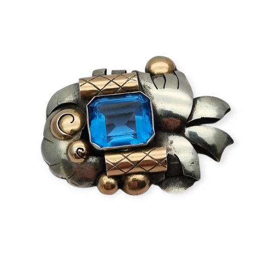 Broche Art Déco  Catalán en plata con vistas de oro y simil aguamarina, circa 1930-1940