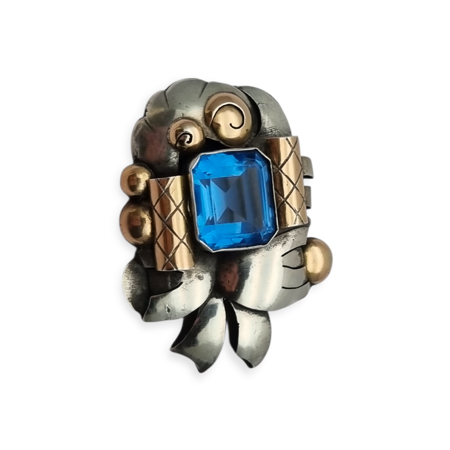 Art Deco Catalan brooch in silver with gold accents and simulated aquamarine, circa 1930-1940
