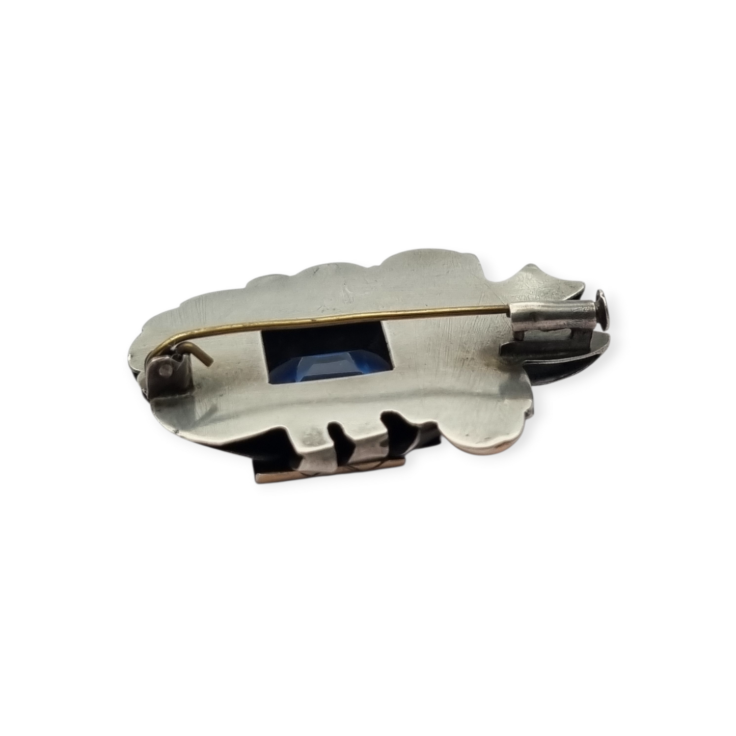 Art Deco Catalan brooch in silver with gold accents and simulated aquamarine, circa 1930-1940