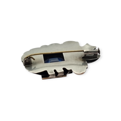 Art Deco Catalan brooch in silver with gold accents and simulated aquamarine, circa 1930-1940