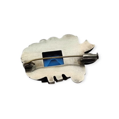 Art Deco Catalan brooch in silver with gold accents and simulated aquamarine, circa 1930-1940