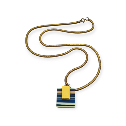 Vintage pop art resin striped blue multicolored pendant with gold metal circa 1980s