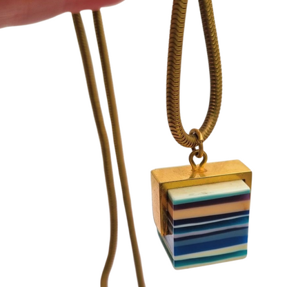 Vintage pop art resin striped blue multicolored pendant with gold metal circa 1980s