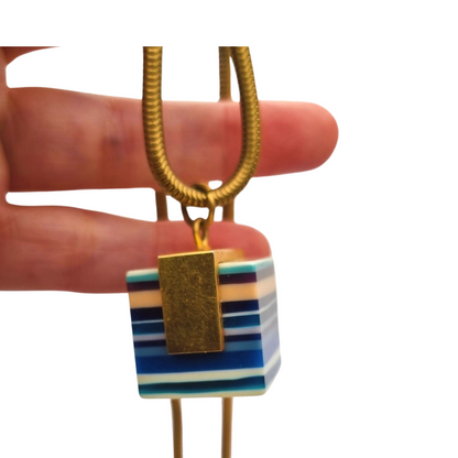 Vintage pop art resin striped blue multicolored pendant with gold metal circa 1980s