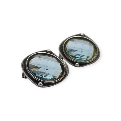 Oval silver earrings with faceted blue stone, circa 1980-90