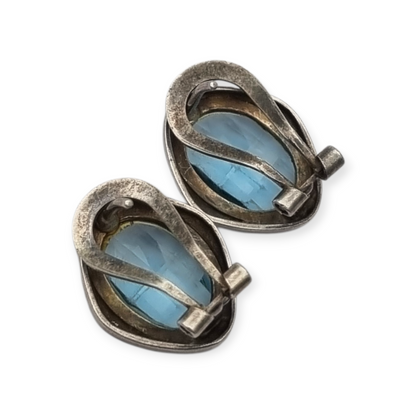 Oval silver earrings with faceted blue stone, circa 1980-90