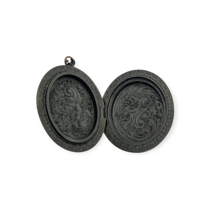 Victorian vulcanite locket, mourning jewelry, raised flower, England circa 1890-1900