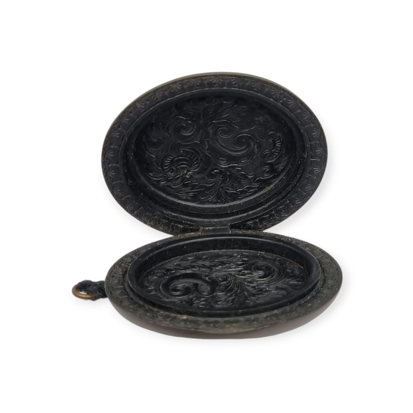 Victorian vulcanite locket, mourning jewelry, raised flower, England circa 1890-1900