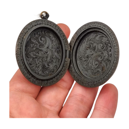 Victorian vulcanite locket, mourning jewelry, raised flower, England circa 1890-1900
