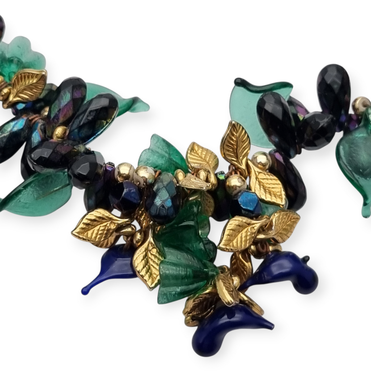 Vintage floral necklace with iridescent beads, leaves, flowers, and blue birds, circa 1990-2000
