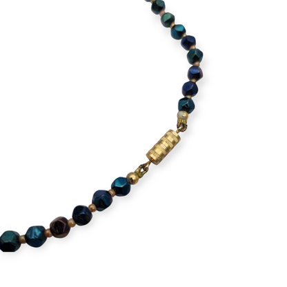 Vintage floral necklace with iridescent beads, leaves, flowers, and blue birds, circa 1990-2000
