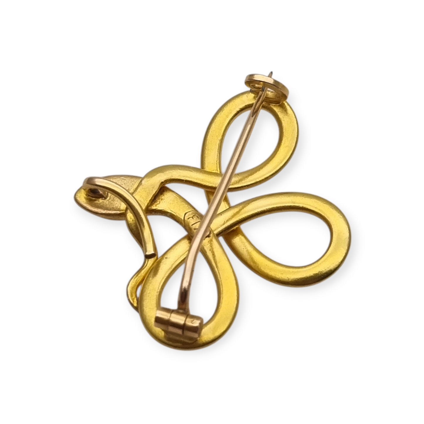 Broche francés FIX con serpiente entrelazada., oro laminado y piedra roja circa 1910