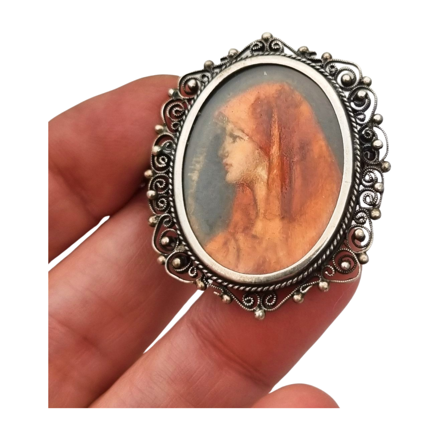 Broche colgante de plata 800 y filigrana con miniatura de Santa Fabiola, circa 1920