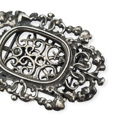 Pierced sterling silver photo frame for a portrait with cherubs, circa 1940-1950