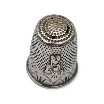 Antique sterling silver thimble with Virgin of Montserrat La Moreneta from the 50s-60s