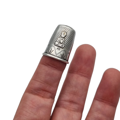 Antique sterling silver thimble with Virgin of Montserrat La Moreneta from the 50s-60s