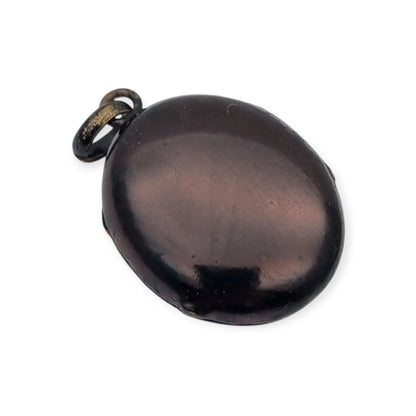 Guardapelo victoriano negro con piedra, joyería de luto, circa 1890-1900