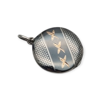 Round locket in nielloed 800 silver with hand engravings, circa 1920-1930