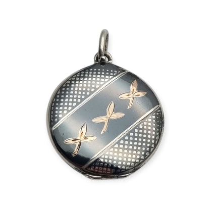 Round locket in nielloed 800 silver with hand engravings, circa 1920-1930