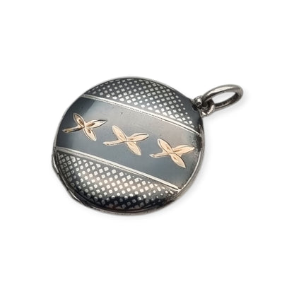 Round locket in nielloed 800 silver with hand engravings, circa 1920-1930
