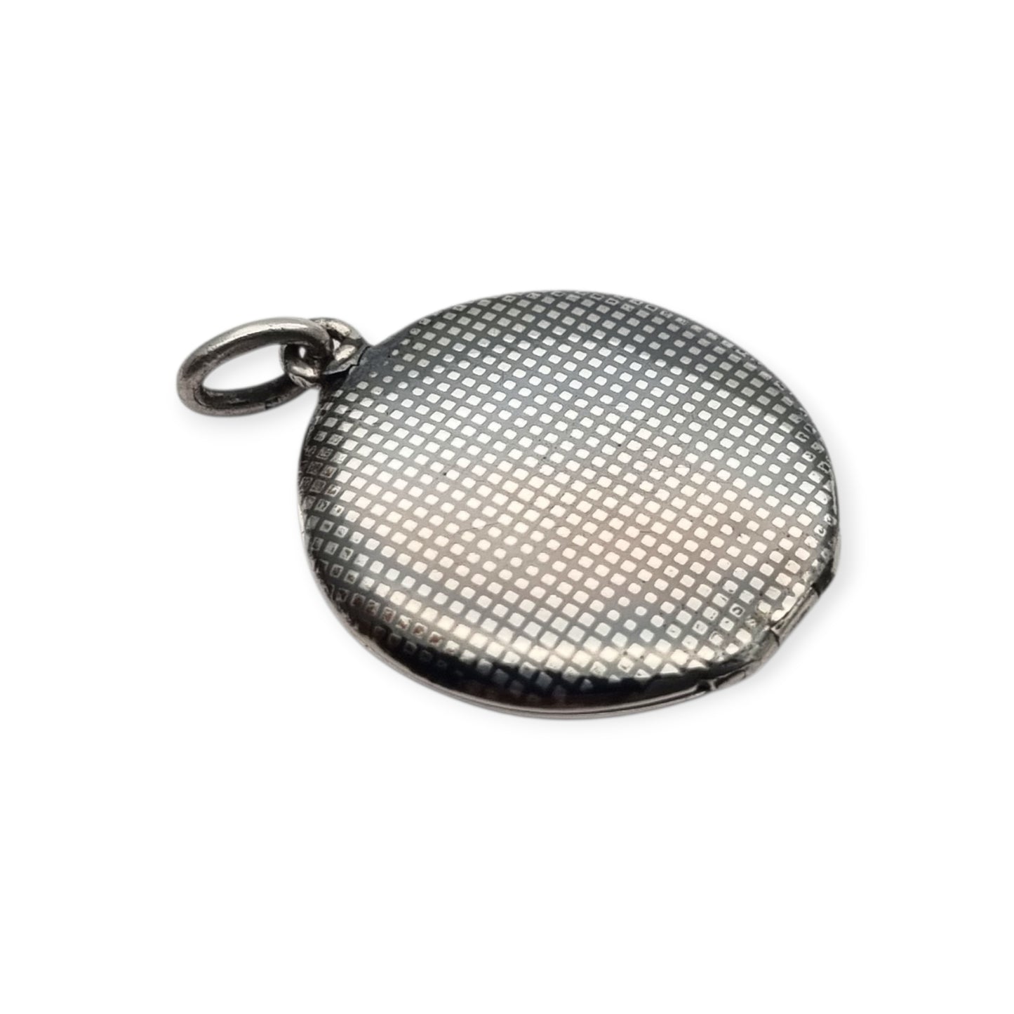 Round locket in nielloed 800 silver with hand engravings, circa 1920-1930