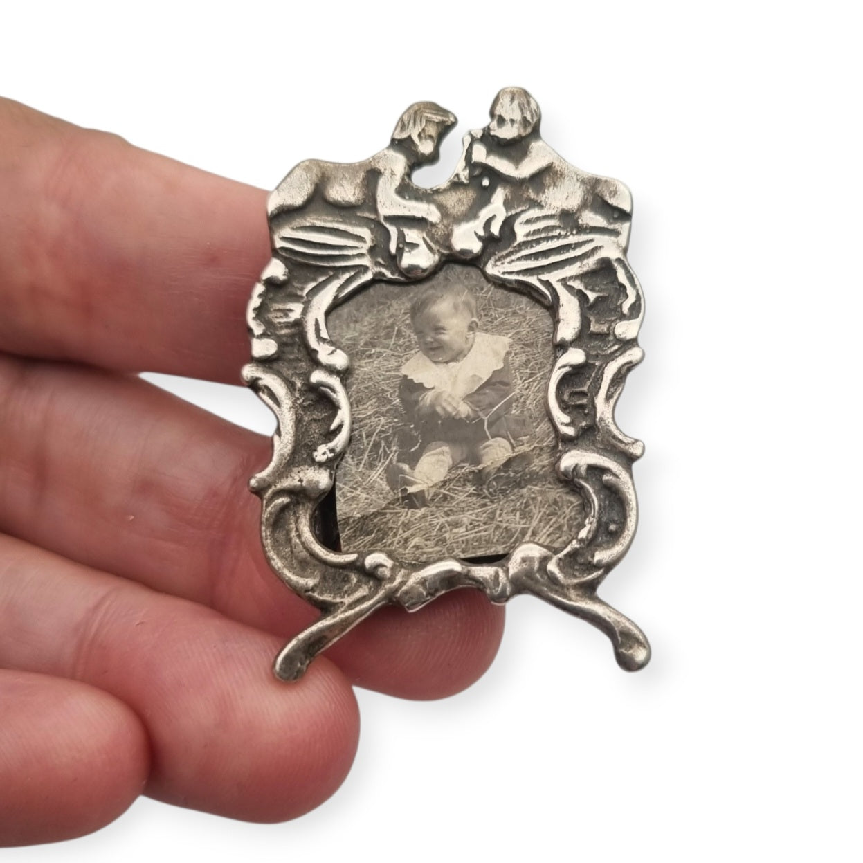 Antique Italian 800 silver children's photo frame, circa 1960, decorative babies