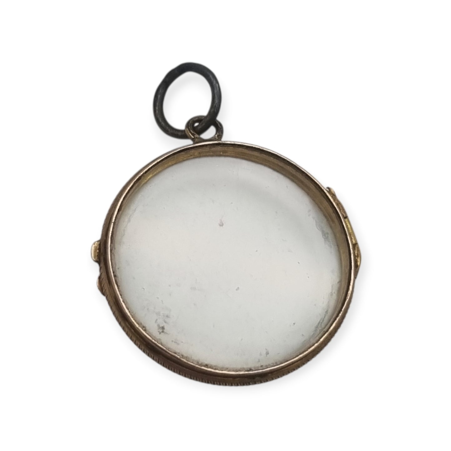 Antique round metal and beveled glass locket pendant, circa 1920