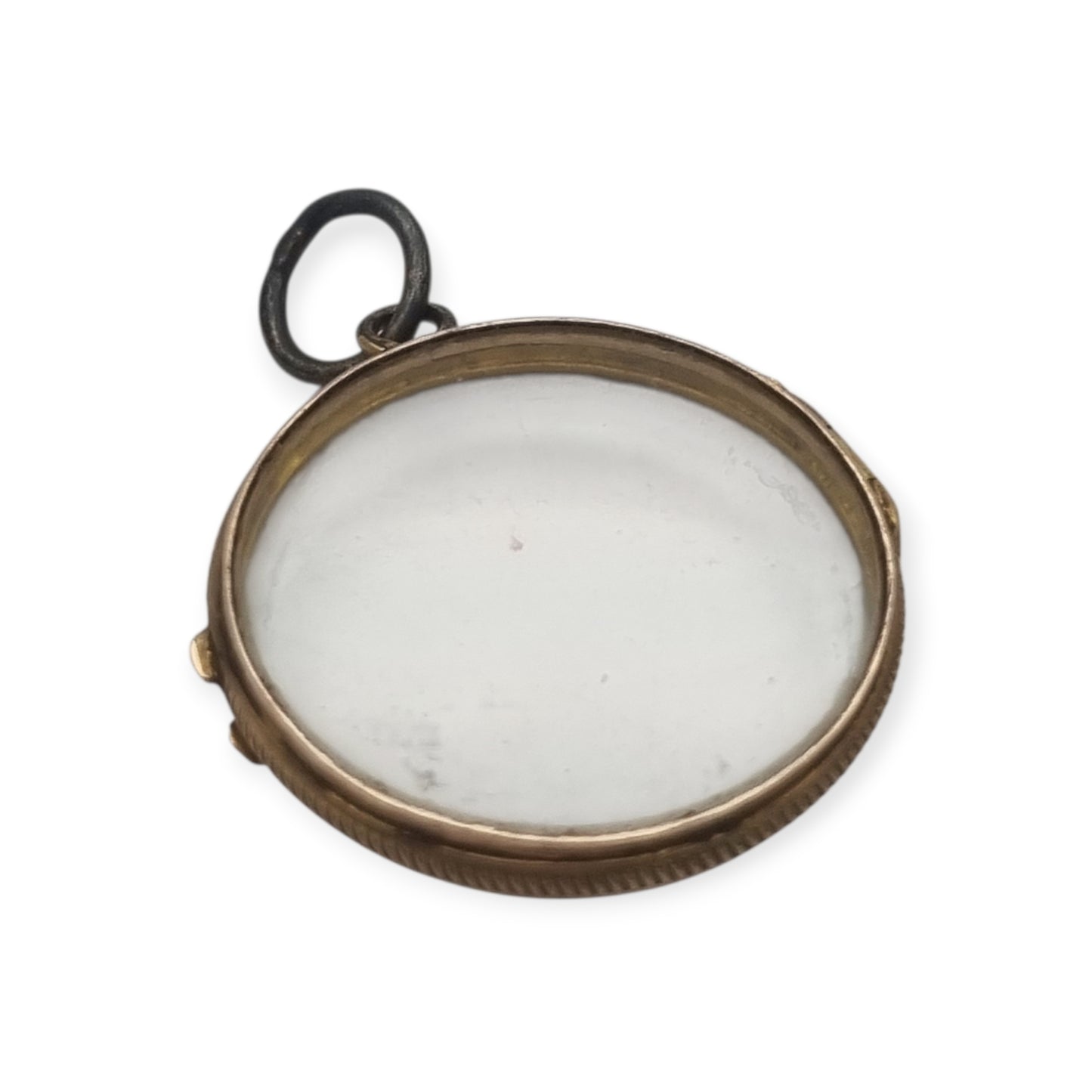 Antique round metal and beveled glass locket pendant, circa 1920