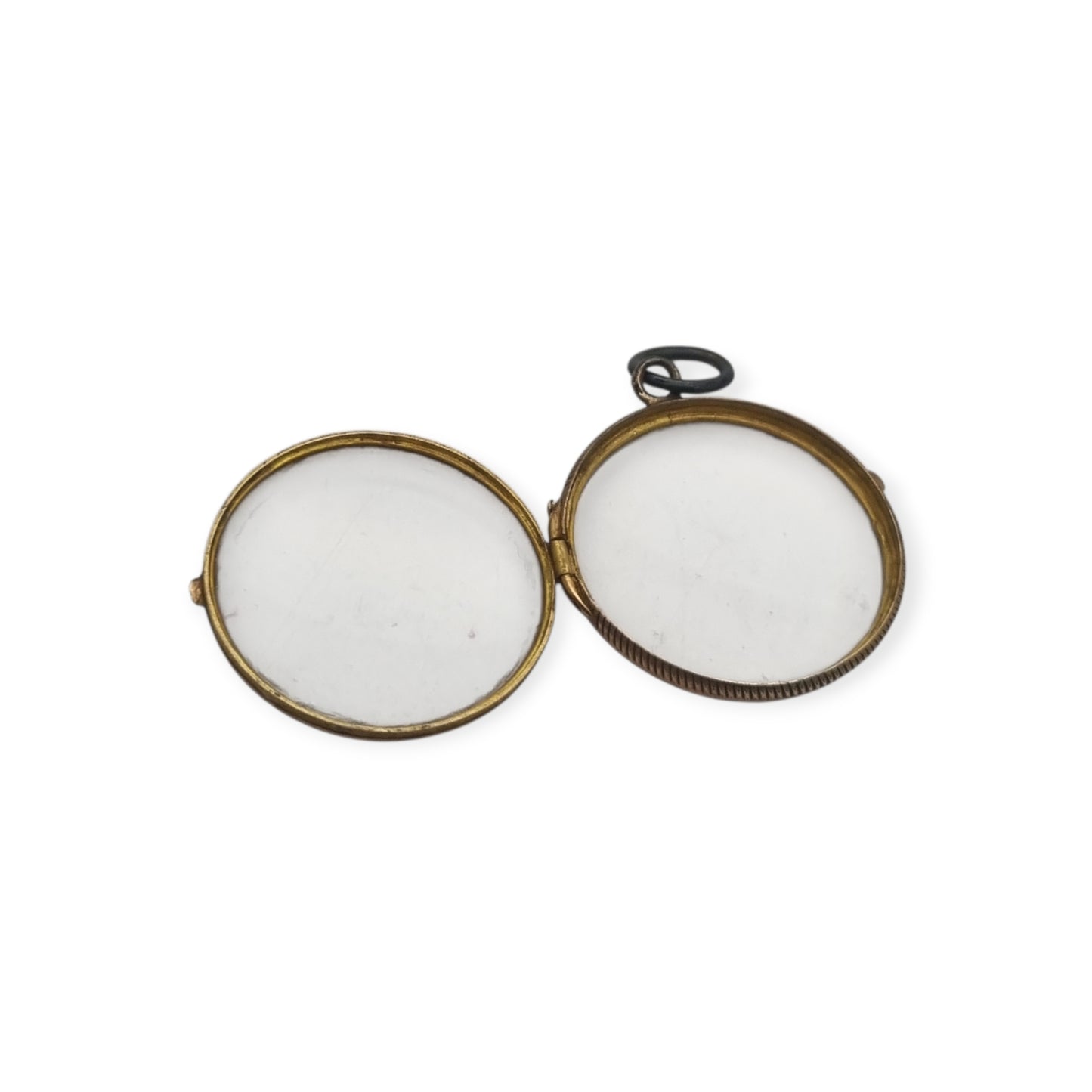 Antique round metal and beveled glass locket pendant, circa 1920