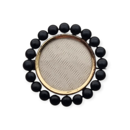 Victorian mourning locket brooch, black lacquered metal, England, circa 1890-1900