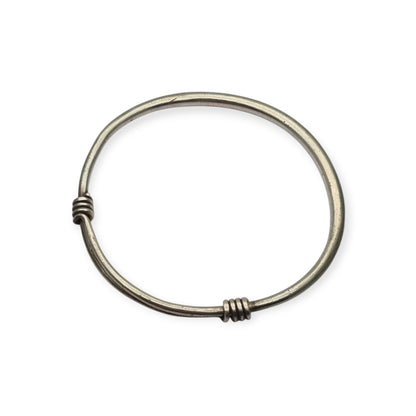 Vintage ethnic silver African knot bracelet, rigid artisan tribal bangle, 20th century