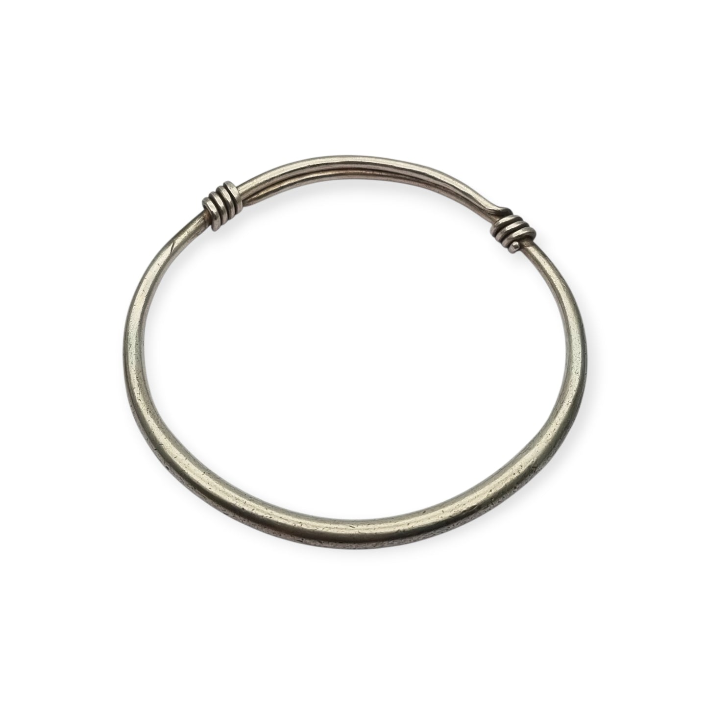 Vintage ethnic silver African knot bracelet, rigid artisan tribal bangle, 20th century