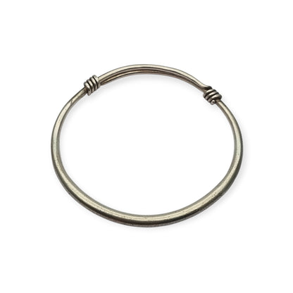 Vintage ethnic silver African knot bracelet, rigid artisan tribal bangle, 20th century