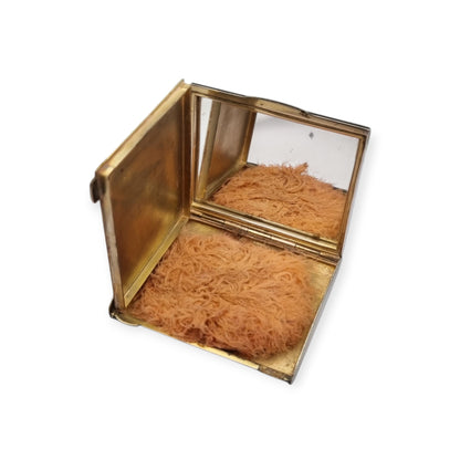 Polvera Art Déco de metal y esmalte negro, Europa, años 40-50, con espejo interior