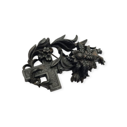 Victorian vulcanite mourning brooch, cross with ivy and flowers, England, circa 1880-1900