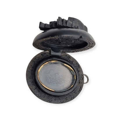 Antique Victorian vulcanite floral locket, circa 1880-1900, mourning jewelry