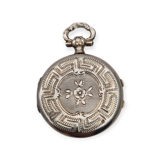 Victorian silver locket with European floral engraving, circa 1910