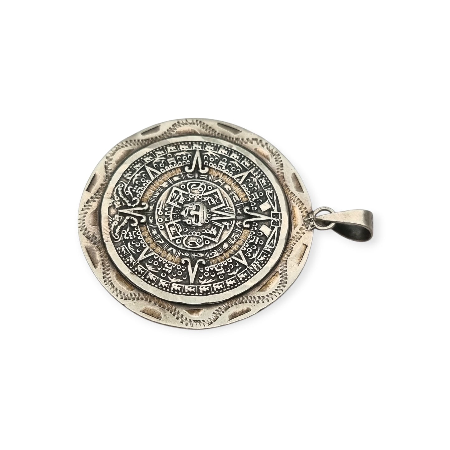 Reversible .925 sterling silver Aztec calendar and mask pendant, Mexico, 1960s-70s