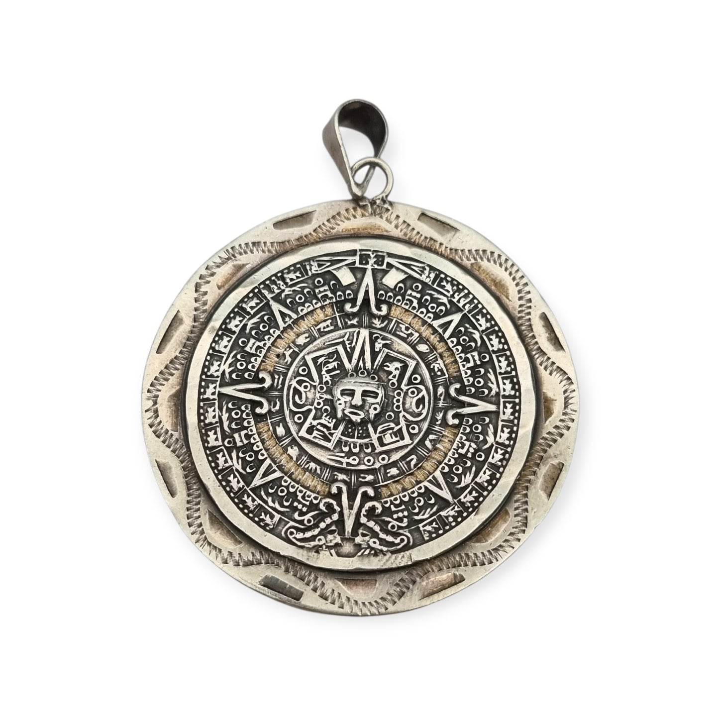 Reversible .925 sterling silver Aztec calendar and mask pendant, Mexico, 1960s-70s