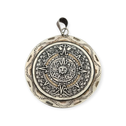 Reversible .925 sterling silver Aztec calendar and mask pendant, Mexico, 1960s-70s