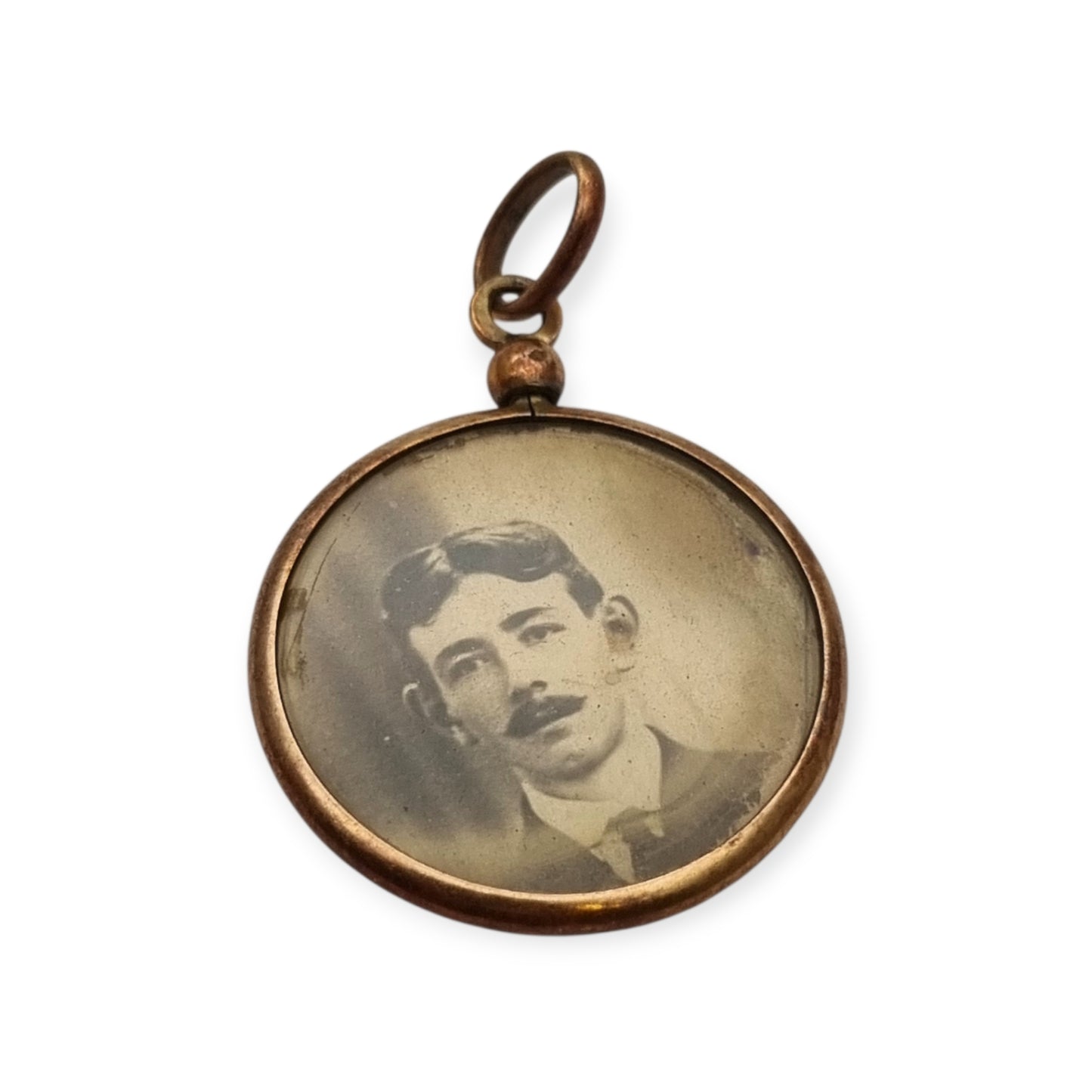 Circular gilded metal and glass locket, antique photo holder, c. 1900